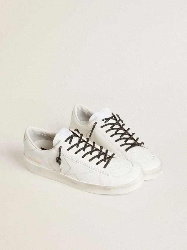 Black laces with silver-colored Swarovski rhinestones