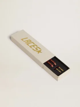 Burgundy cotton laces with contrasting gold-colored logo