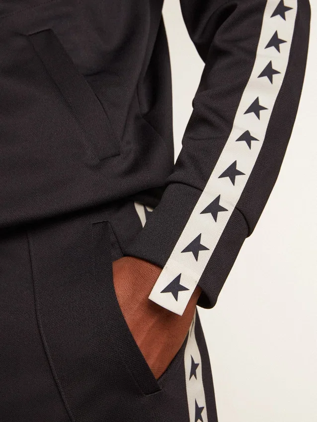 Dark blue sweatshirt with white strip and contrasting blue stars