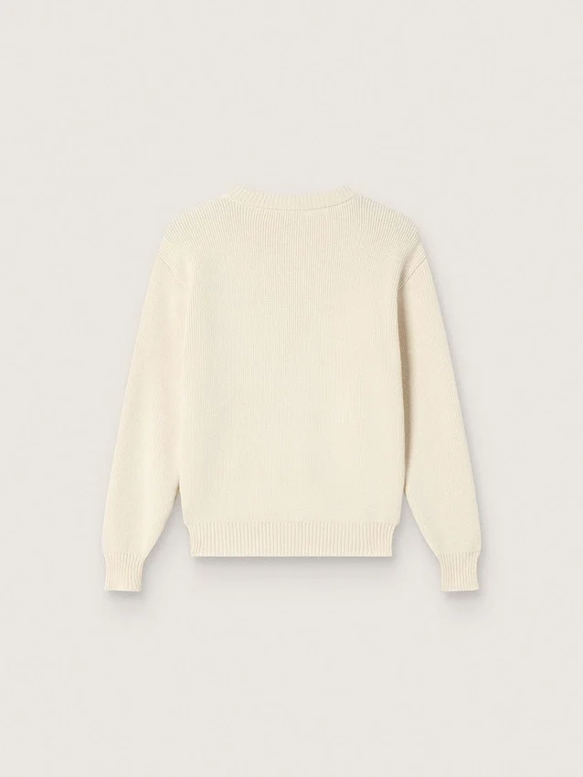 Golden girls’ sweater in white cotton yarn with mascot embroidery