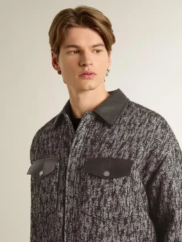 Gray herringbone jacket with black leather details