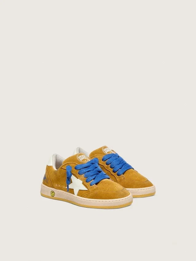 Junior Ball Star in ocher suede with glossy white leather star and heel tab
