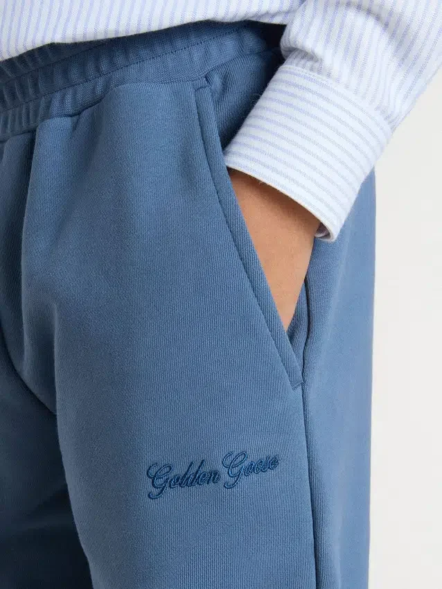 Kids’ blue joggers with embroidery