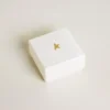 Letter F charm in gold-colored brass with crystals