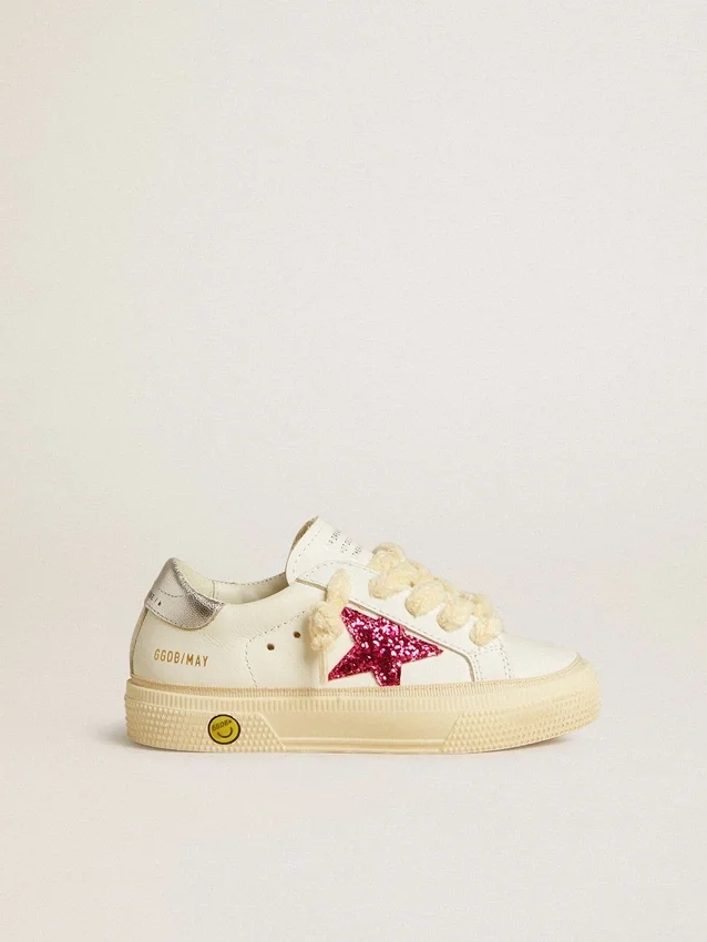 May Young with fuchsia glitter star and metallic leather heel tab
