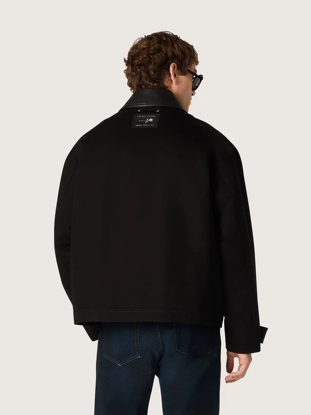 Men's short padded jacket in black cotton with leather collar