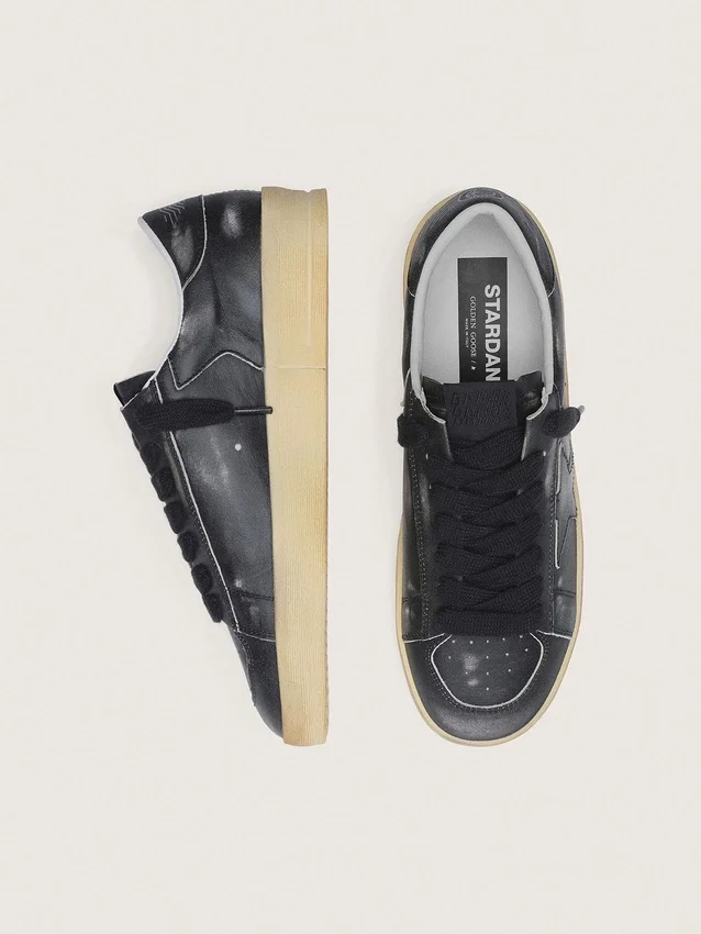 Men's Stardan in black leather with black leather star and heel tab