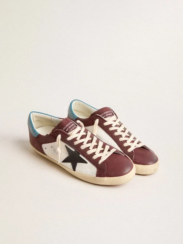 Men’s Super-Star in crackle leather with brown star and teal heel tab
