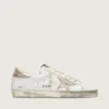 Women's Super-Star with gold sparkle foxing and metal stud lettering