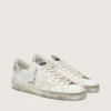 Women's Super-Star with gold sparkle foxing and metal stud lettering