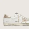 Women's Super-Star with gold sparkle foxing and metal stud lettering