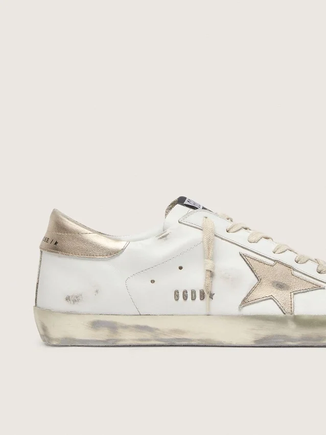 Women's Super-Star with gold sparkle foxing and metal stud lettering
