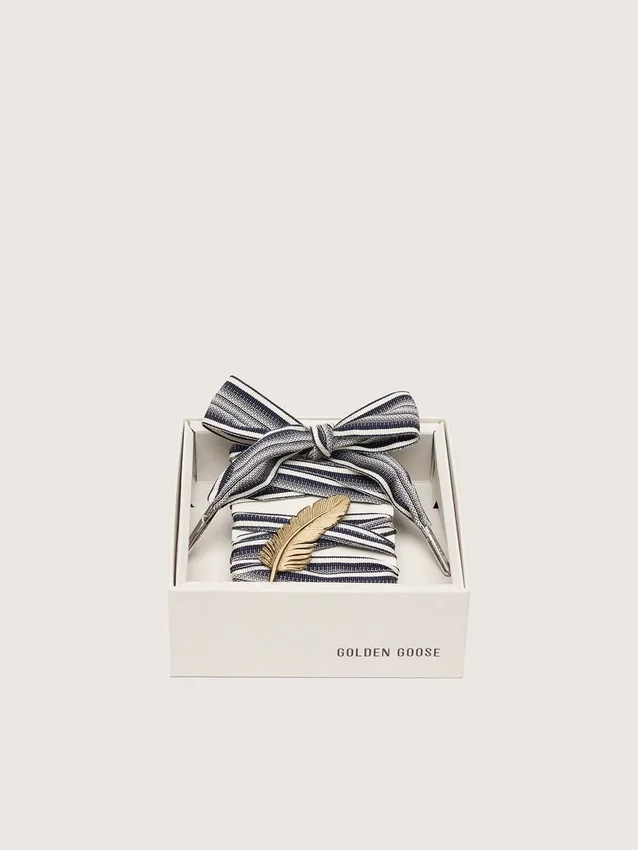 Skins striped laces with gold feather charm