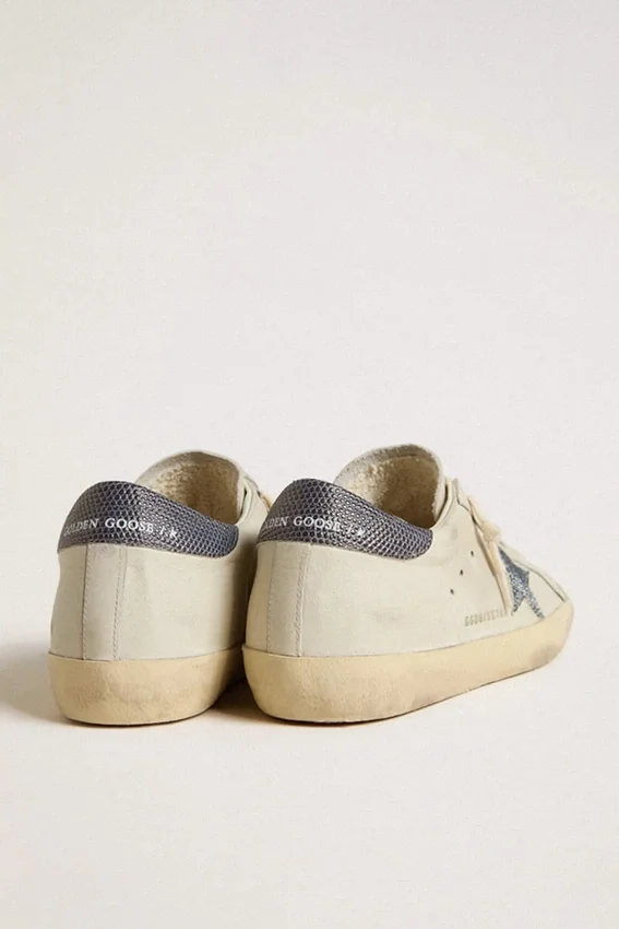 Super-Star with cream-colored leather star with Swarovski crystals and blue leather heel tab with lizard print