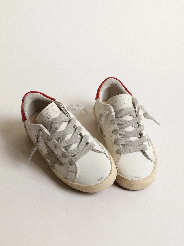 Super-Star Young with suede star and red leather heel tab