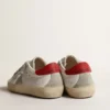 Super-Star Young with suede star and red leather heel tab