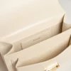 Venezia Bag in butter-colored boarded leather with silk scarf