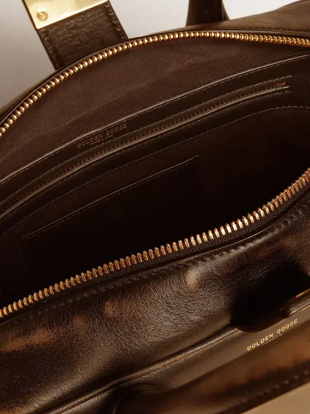 Vita Bag in black distressed leather with gold details