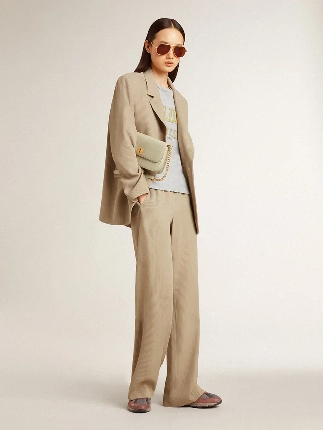 Women's beige pinstripe single-breasted jacket with an oversized fit
