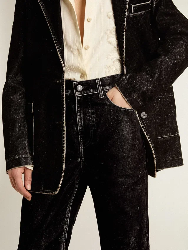 Women's black jeans with a velvet-like wash effect