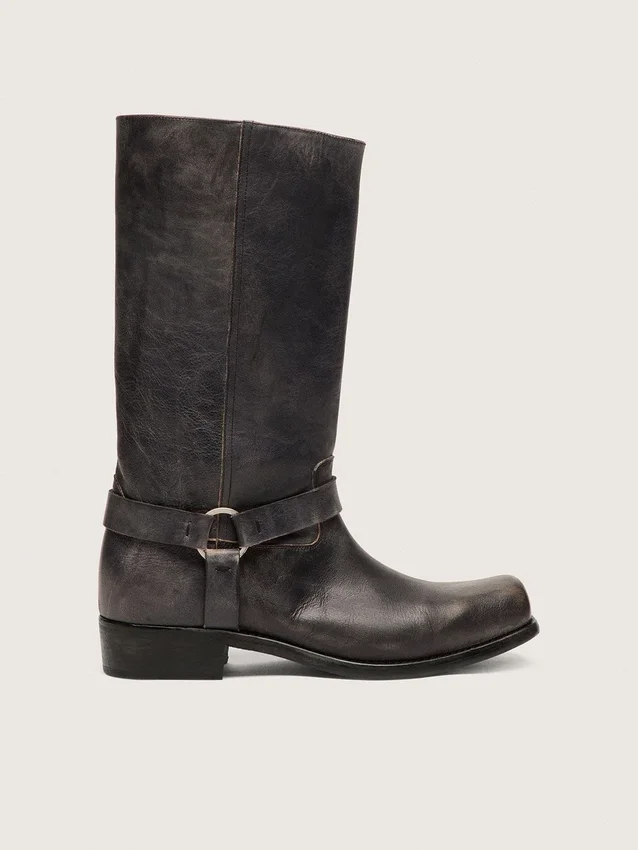Women's high Biker boots in black leather with strap and silver-colored buckle