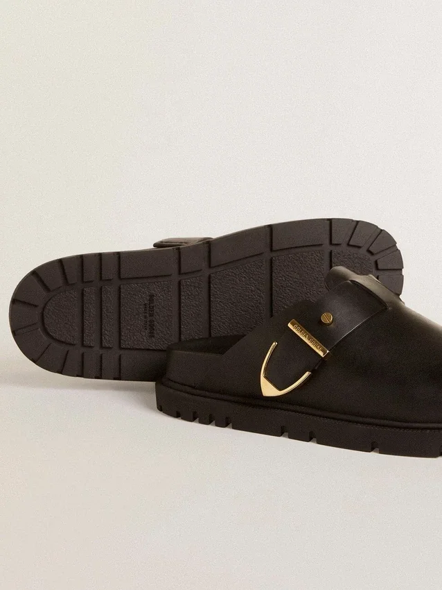 Women's Lucy Sabot in glossy black leather with gold metal buckle