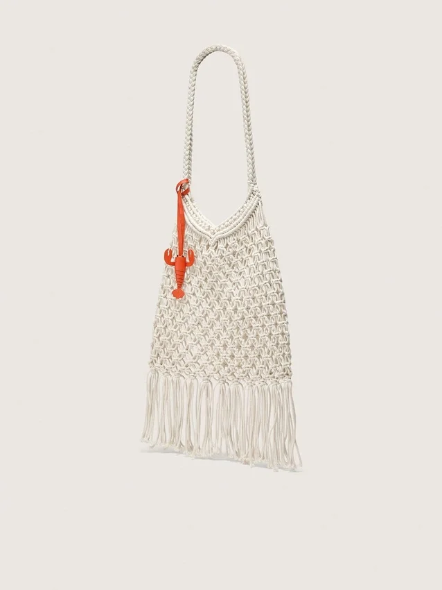 Women's macramé bag in butter-colored cotton with a leather lobster charm