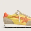 Men’s Marathon with yellow nylon upper and orange star