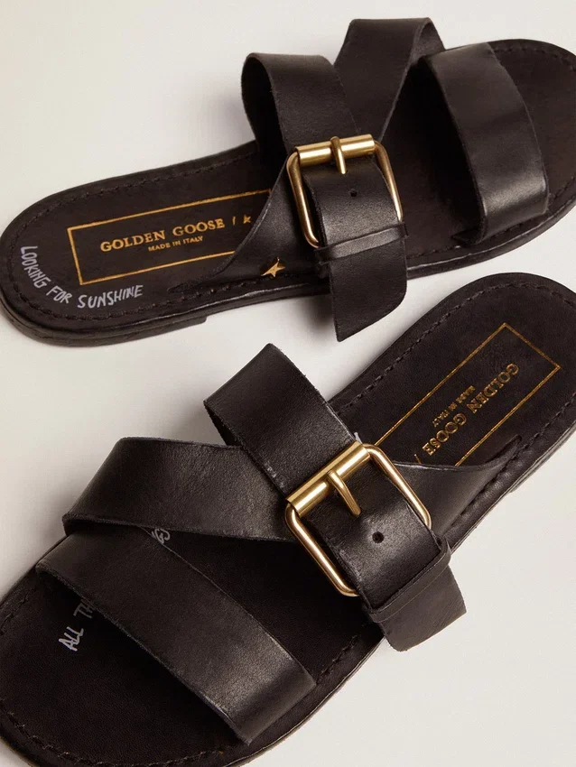 Women's Margaret flat sandals in black resin-coated leather