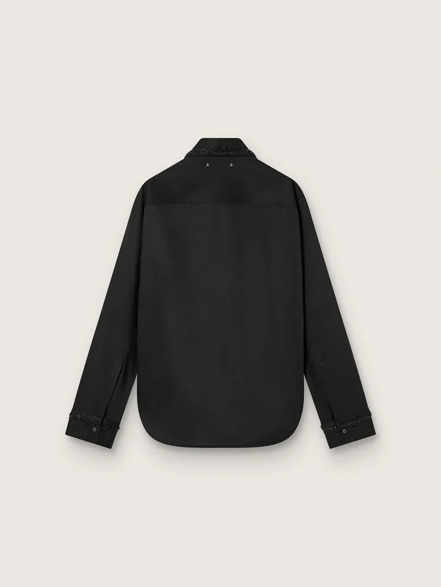 Women's shirt in black wool twill with floral embroidery in glass beads