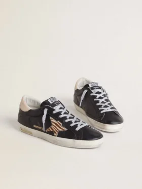 Women’s Super-Star in black nappa leather with zebra-print pony skin star and beige leather heel tab