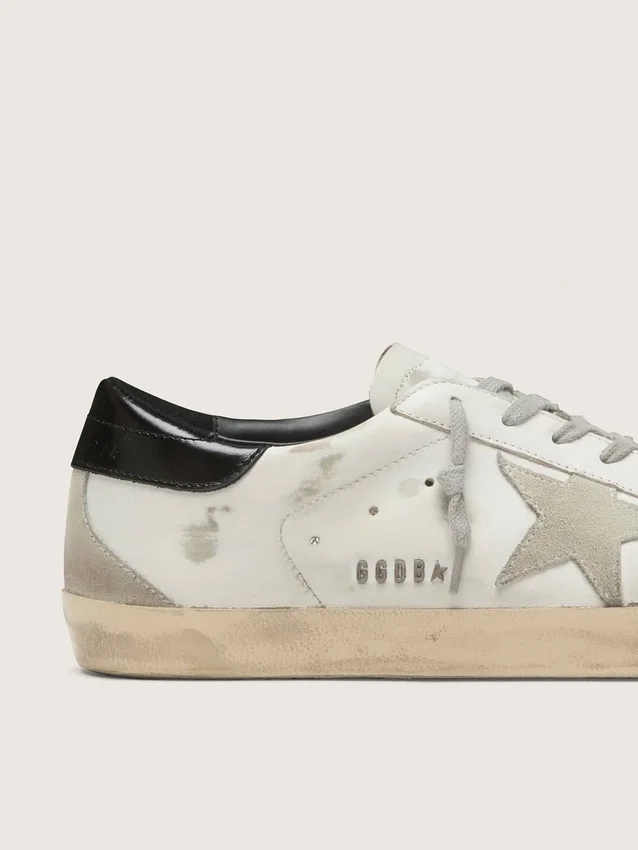 Women's Super-Star with black heel tab and metal stud lettering