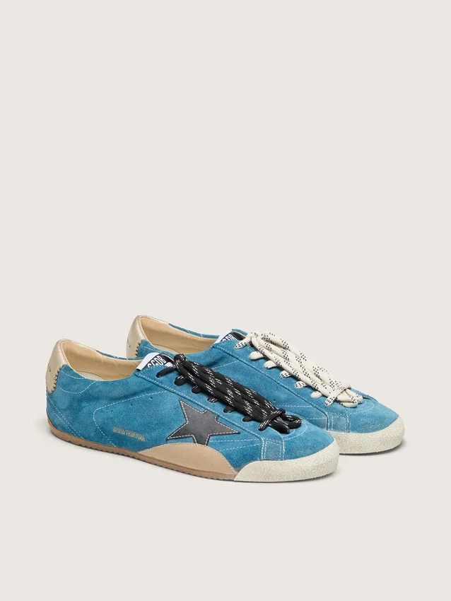 Women's True-Star in teal suede with black star and cream heel tab