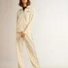 Women’s white joggers with stars on the sides