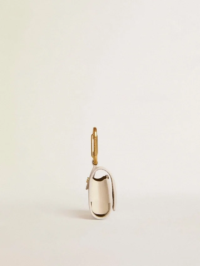 Worn white AirPod case