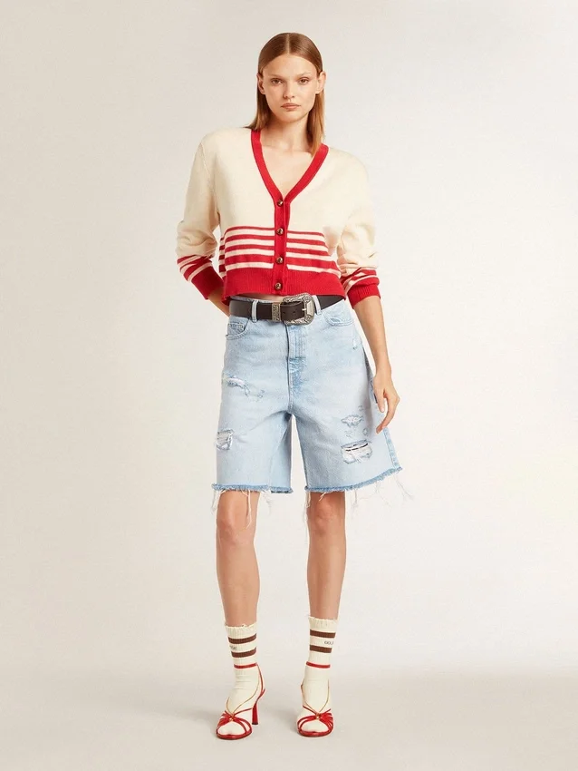 Worn-white socks with distressed details and brown stripes