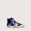 Young Francy Penstar in blue sequins with white suede star
