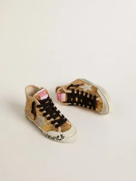 Young Francy Penstar in gold sequins with ice-gray suede star