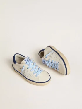 Young Super-Star in white leather with blue suede heel tab